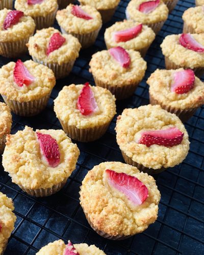 Ricotta Muffins containing orange Rind and topped with strawberry pieces