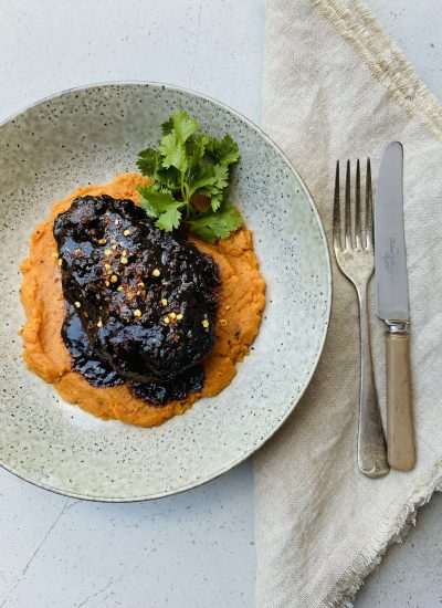 A spiced Beef Cheek served on mashed sweet potato.